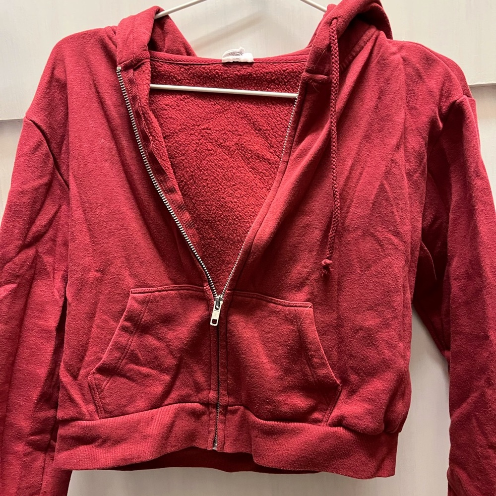red zip up sweater